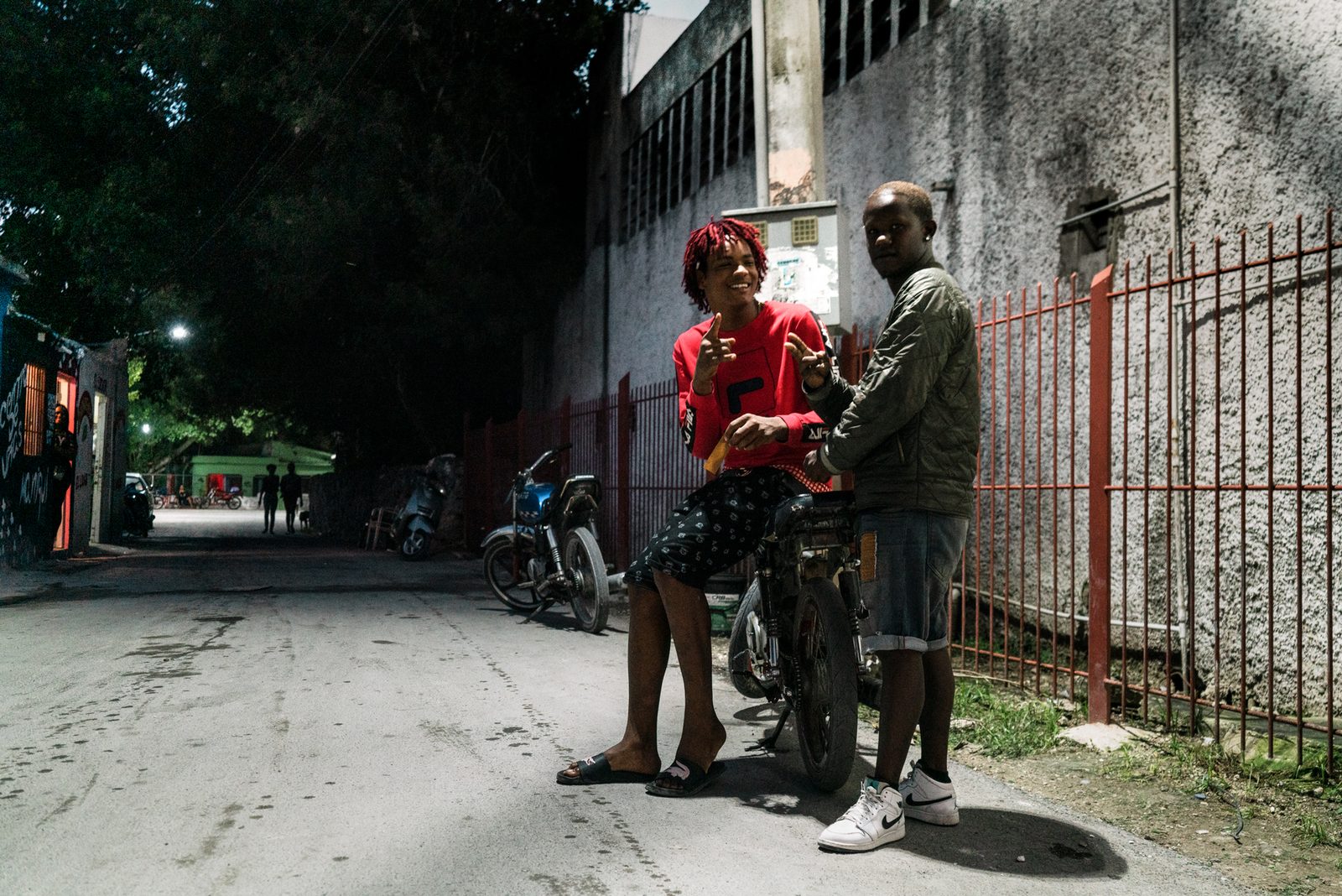 Two men talking on a street — Punta Cana