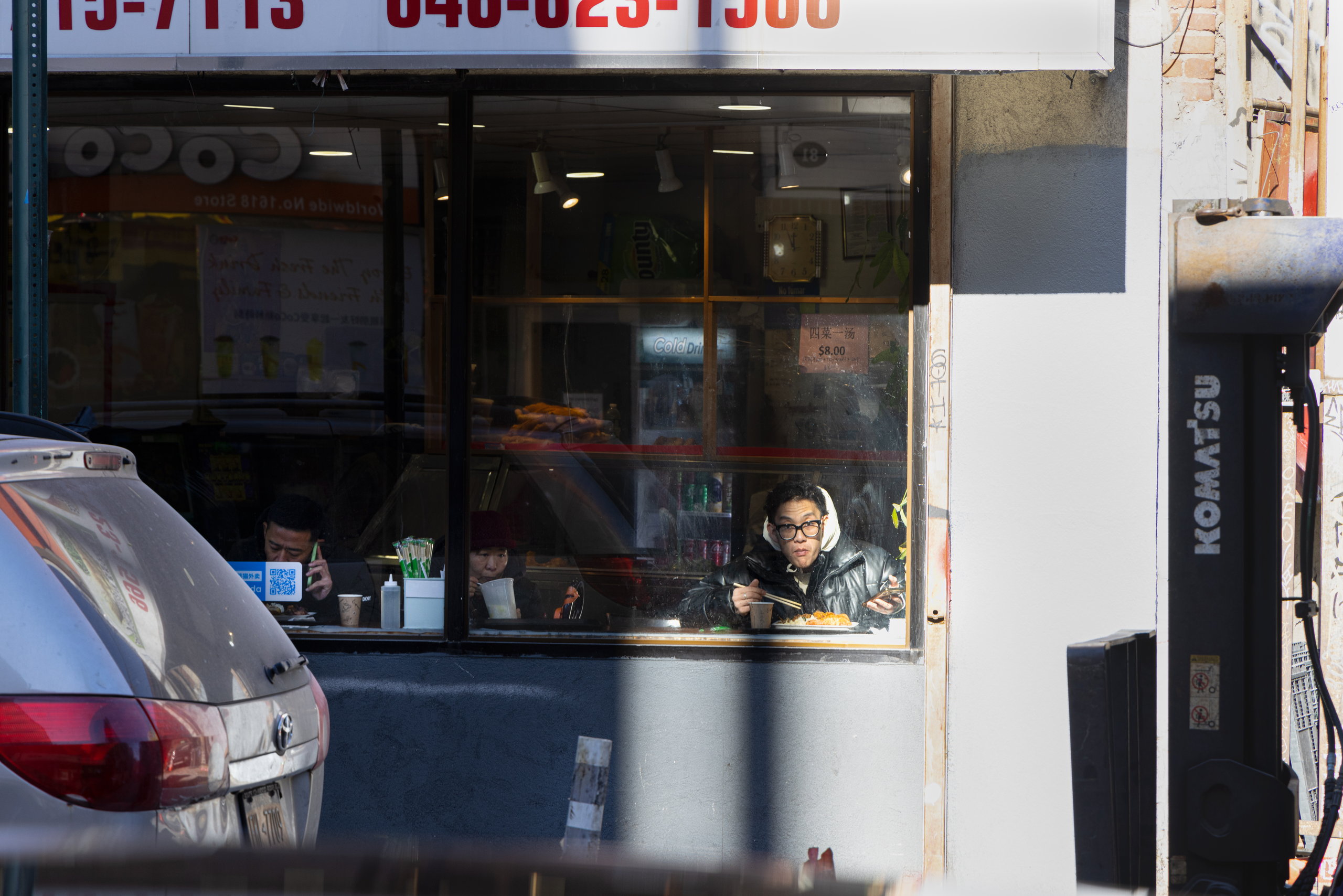 A man seen through a shop window — Win or Lose